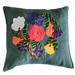 Flower pillow on emerald linen