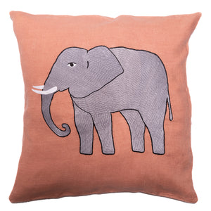 Elephant pillow on pink linen