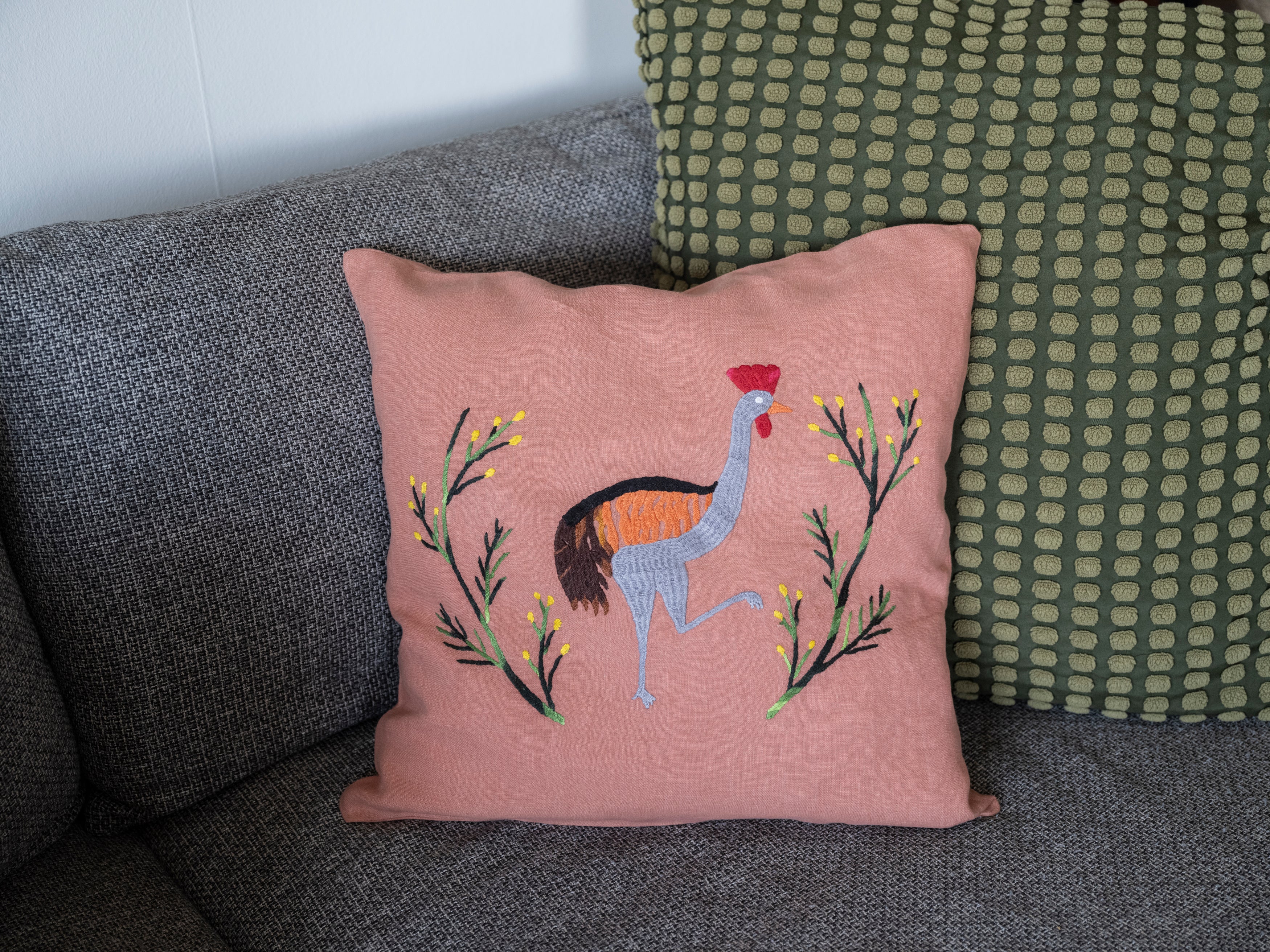Crane pillow on pink linen