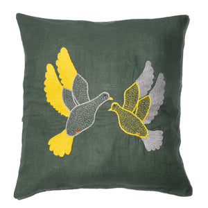 Flying dove pillow on emerald linen