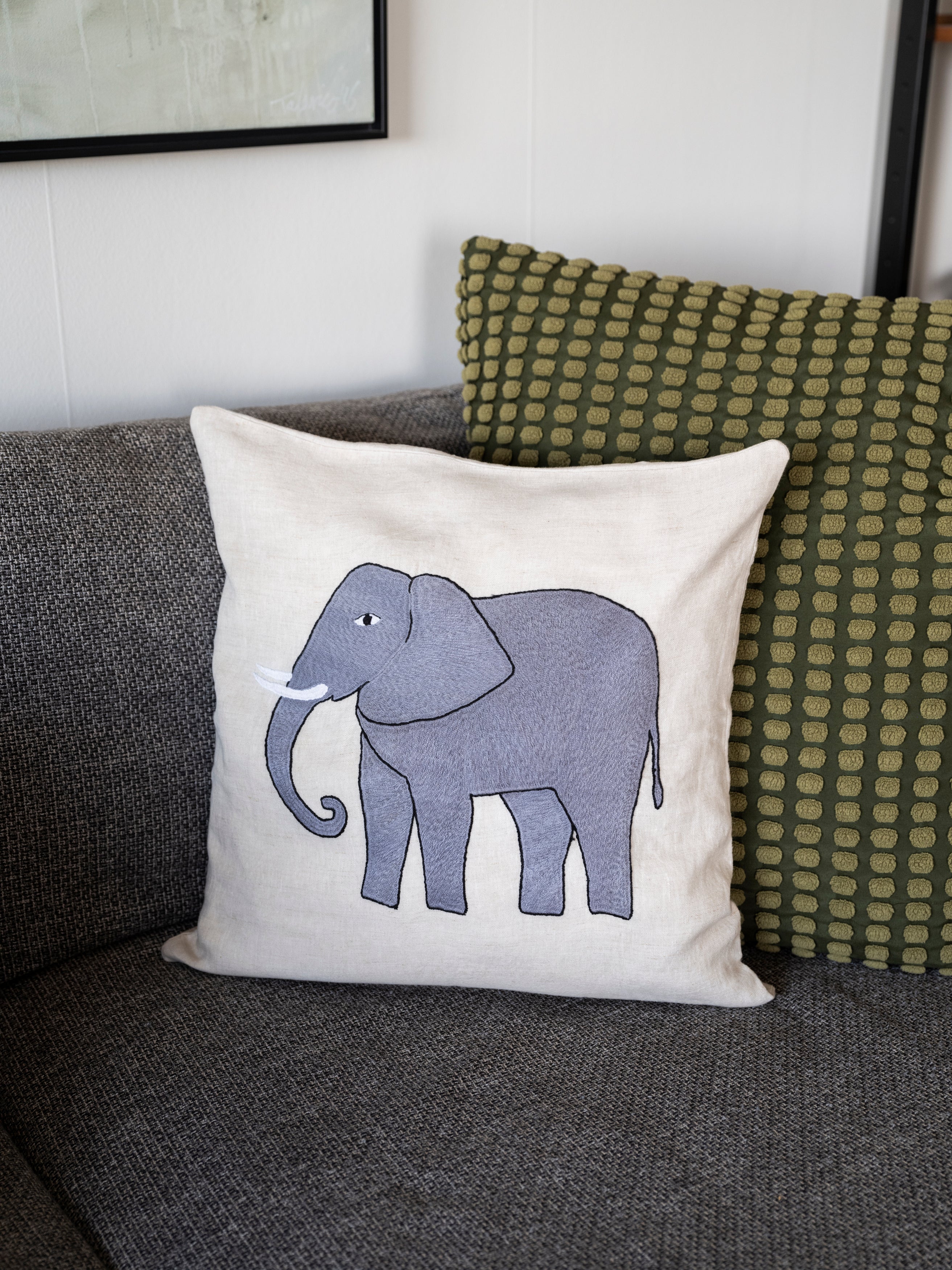 Elephant pillow on natural linen
