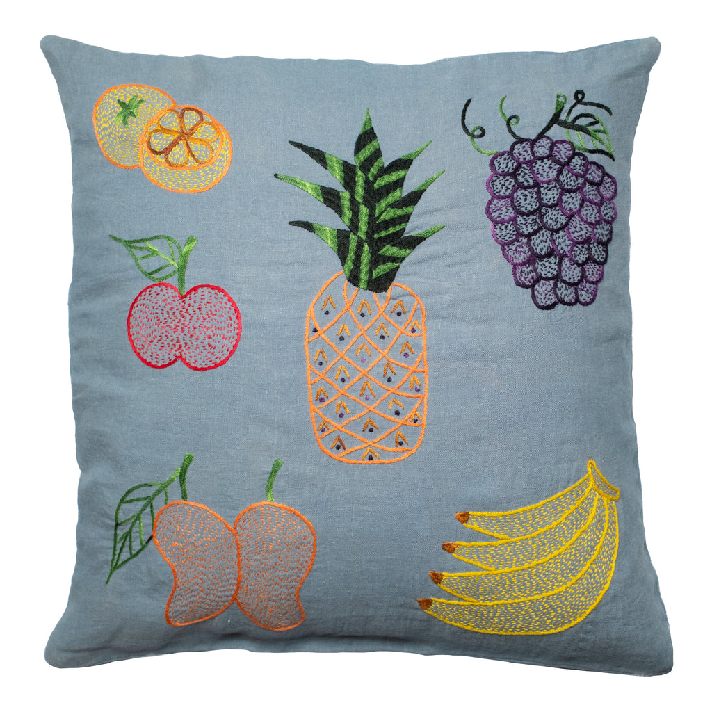 Fruits pillow on blue linen