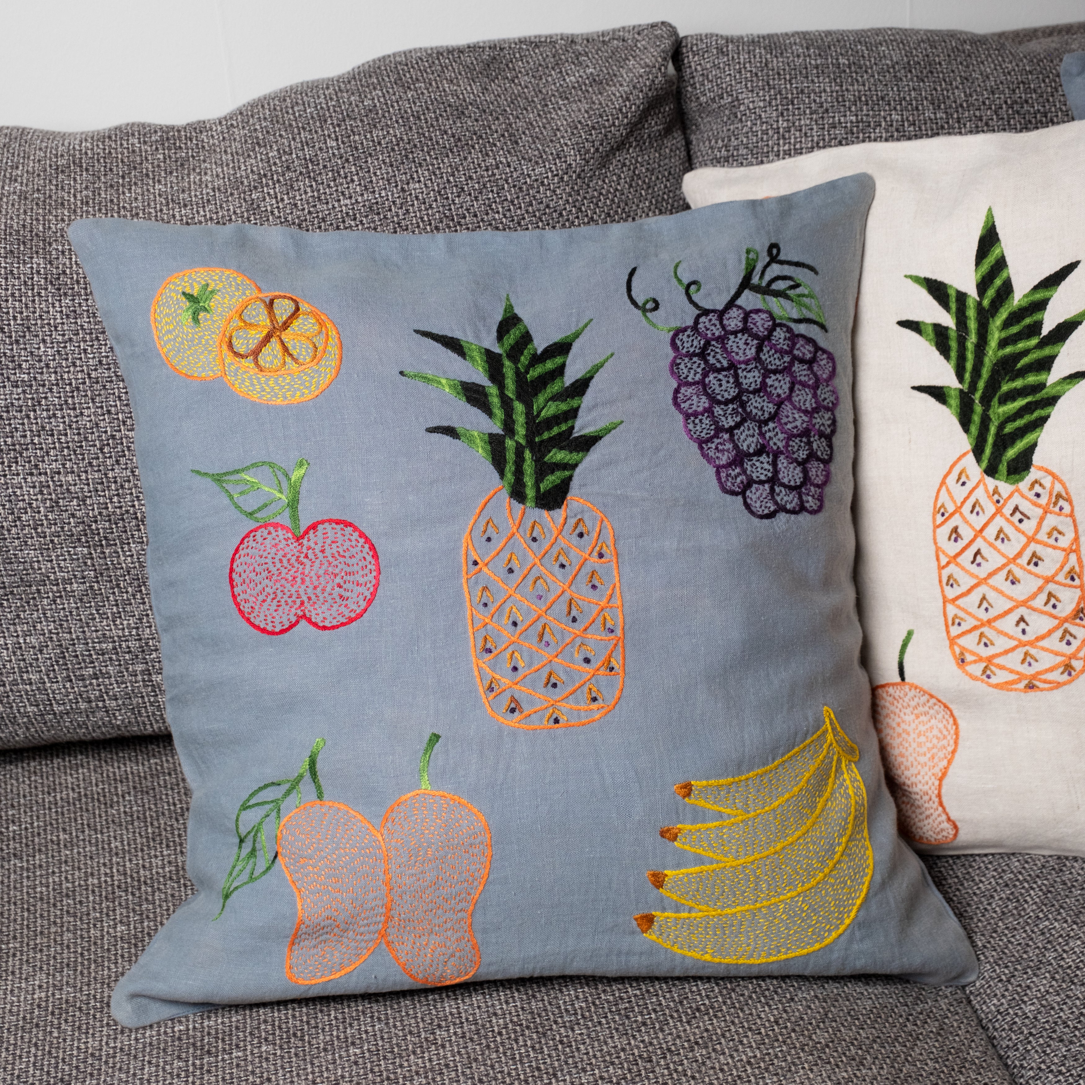 Fruits pillow on blue linen