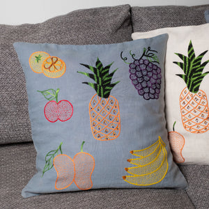 Fruits pillow on blue linen