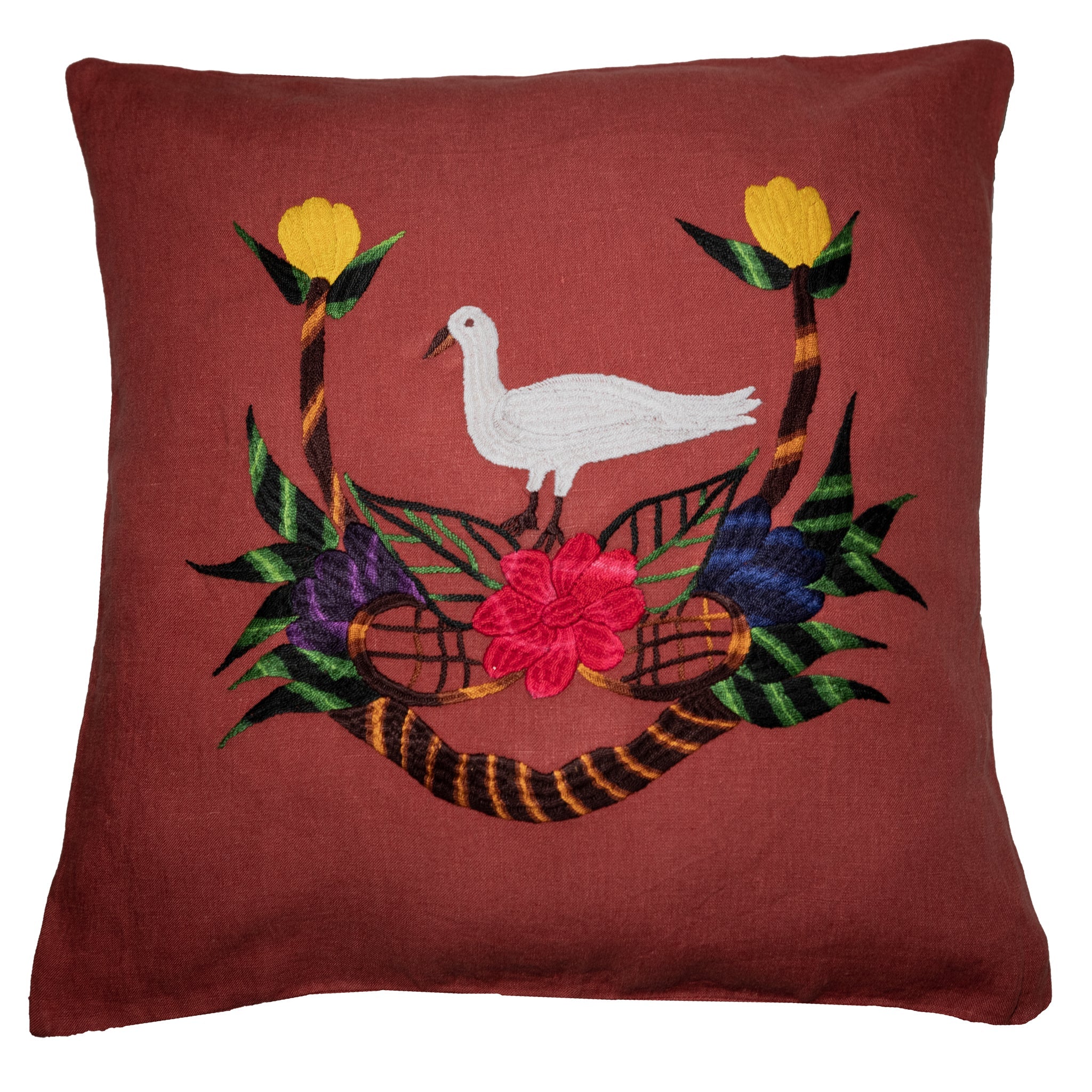 Bird pillow on red linen
